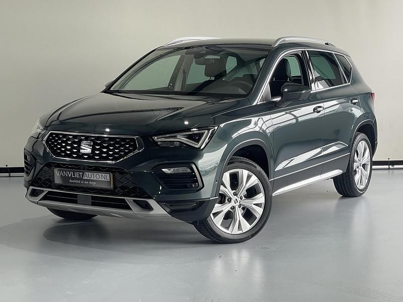 Groen, metallic lak Gebruikt 2021 Seat Ateca Business SUV | € 23.950 (Eerlijke prijs) - Afbeelding 1/4