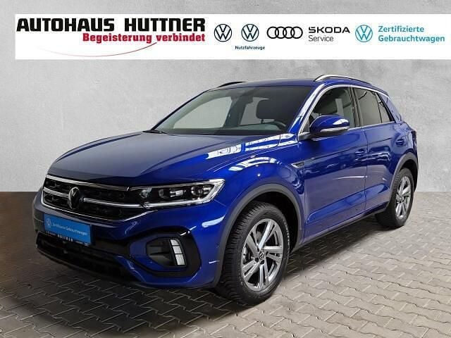 Blauw Gebruikt 2023 VW T-Roc R-line SUV | € 33.558 (Iets duurder) - Afbeelding 1/4