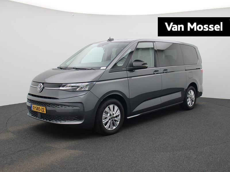 Grijs (metallic) Gebruikt 2024 VW Multivan Business Van | € 53.900 (Goede deal) - Afbeelding 1/4