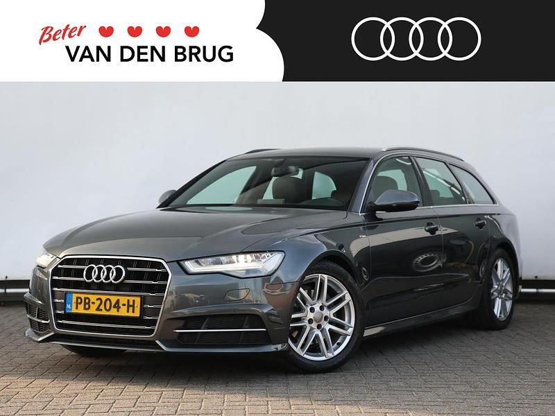 Grijs Occasion 2017 Audi A6 S-Line Stationwagen | € 31.095 (Duur) - Afbeelding 1/4