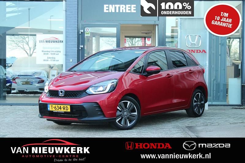 Rood (metallic) Gebruikt 2023 Honda Jazz Advance Hatchback | € 25.900 (Goede deal) - Afbeelding 1/4