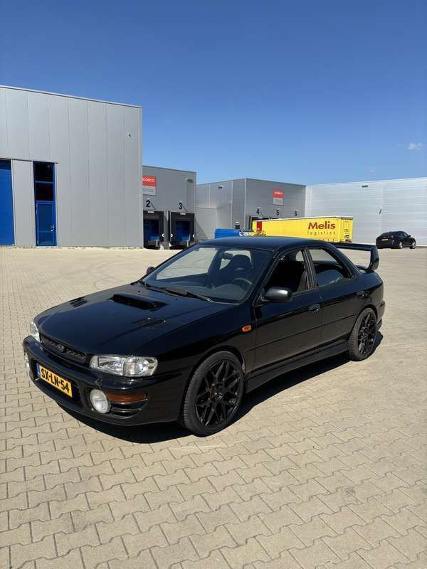 Zwart Gebruikt 1998 Subaru Impreza Sedan | € 7.500 - Afbeelding 1/4