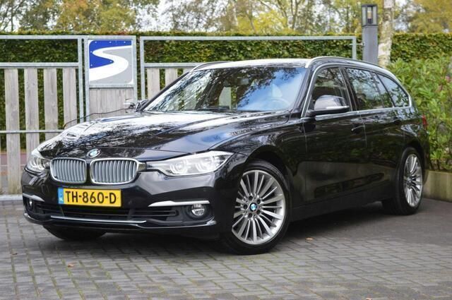 Zwart Gebruikt 2018 BMW 320 Luxury Line Stationwagen | € 21.750 (Eerlijke prijs) - Afbeelding 1/4