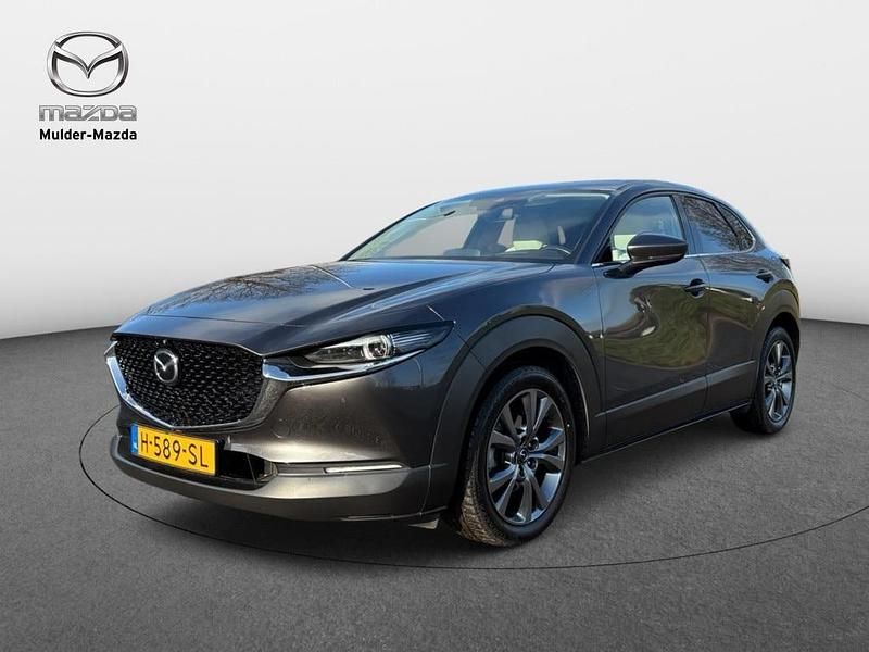 Machine gray (grijs metallic) Occasion 2020 Mazda CX-30 Luxury SUV | € 23.950 (Eerlijke prijs) - Afbeelding 1/3