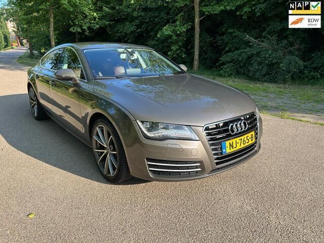 Grijs Gebruikt 2011 Audi A7 Sportback Hatchback | € 11.945 (Eerlijke prijs) - Afbeelding 1/4