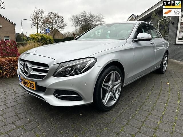 Grijs Gebruikt 2014 Mercedes C180 Edition Sedan | € 12.900 (Goede deal) - Afbeelding 1/4