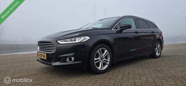 Zwart (metallic) Gebruikt 2015 Ford Mondeo Titanium Stationwagen | € 5.499 - Afbeelding 1/4