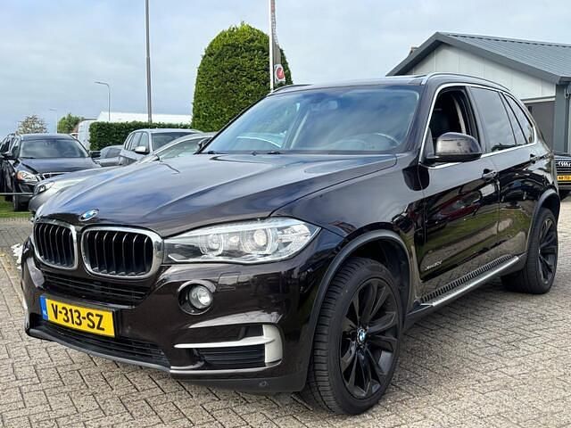 Bruin Gebruikt 2014 BMW X5 Sport Line SUV | € 16.950 (Iets duurder) - Afbeelding 1/4