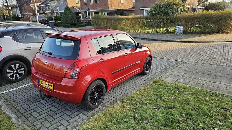 Occasion Suzuki Swift 92 PK (67 kW) 2009 Rood Sedan