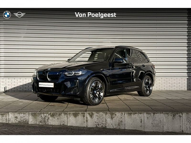 M carbonschwarz Gebruikt 2025 BMW iX3 Comfort Edition SUV | € 76.900 - Afbeelding 1/4