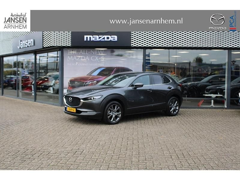 Machine gray Gebruikt 2021 Mazda CX-30 Luxury SUV | € 26.900 (Eerlijke prijs) - Afbeelding 1/4