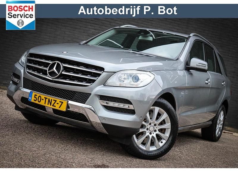 Grijs Occasion 2012 Mercedes 350 SUV | € 18.950 (Eerlijke prijs) - Afbeelding 1/4