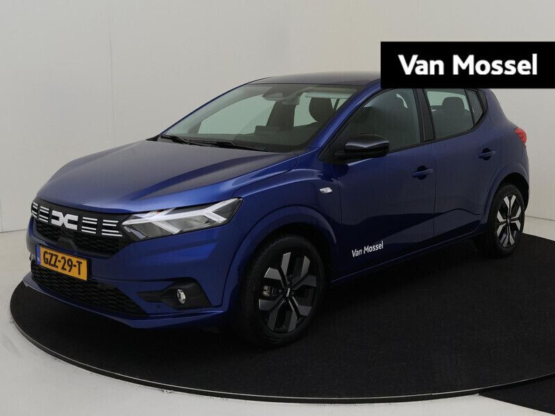 Blauw Gebruikt 2024 Dacia Sandero Expression Hatchback | € 20.435 (Eerlijke prijs) - Afbeelding 1/4
