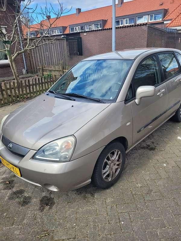 Beige Gebruikt 2001 Suzuki Liana GLX Stationwagen | € 2.995 (Iets duurder) - Afbeelding 1/4