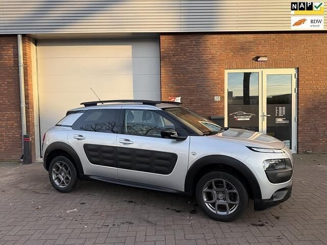 Grijs (metallic) Occasion 2016 Citroën C4 PureTech SUV | € 8.499 (Goede deal) - Afbeelding 1/4