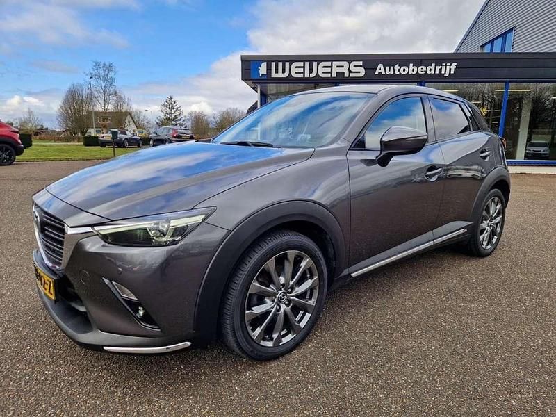 Grijs, metallic lak Gebruikt 2020 Mazda CX-3 Luxury SUV | € 22.950 (Iets duurder) - Afbeelding 1/4