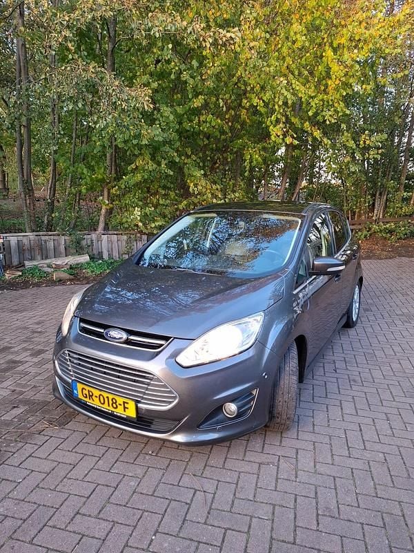 Grijs (metallic) Gebruikt 2015 Ford C-MAX Titanium MPV | € 6.900 - Afbeelding 1/4