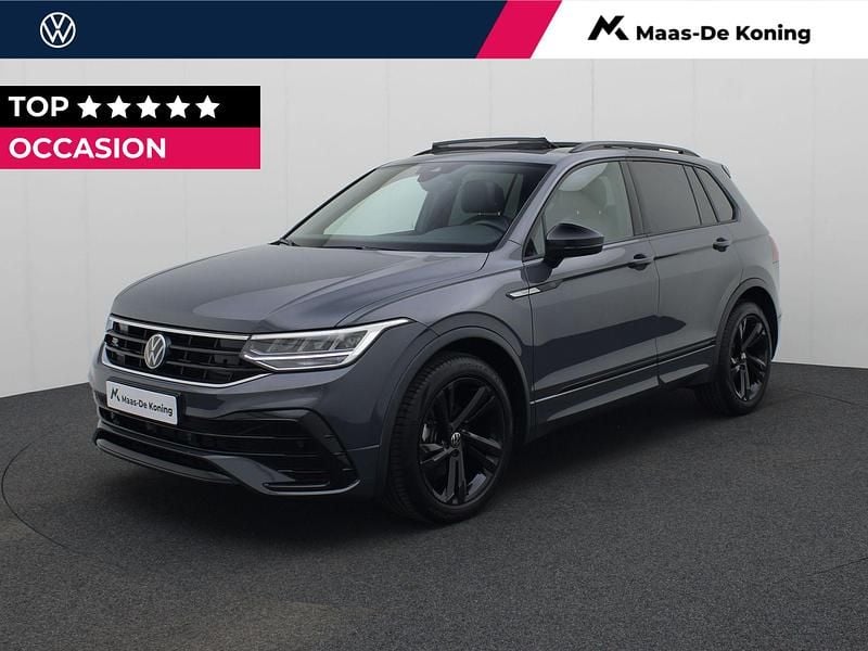 Grijs, metallic lak Gebruikt 2024 VW Tiguan R-line SUV | € 42.740 (Super prijs) - Afbeelding 1/4