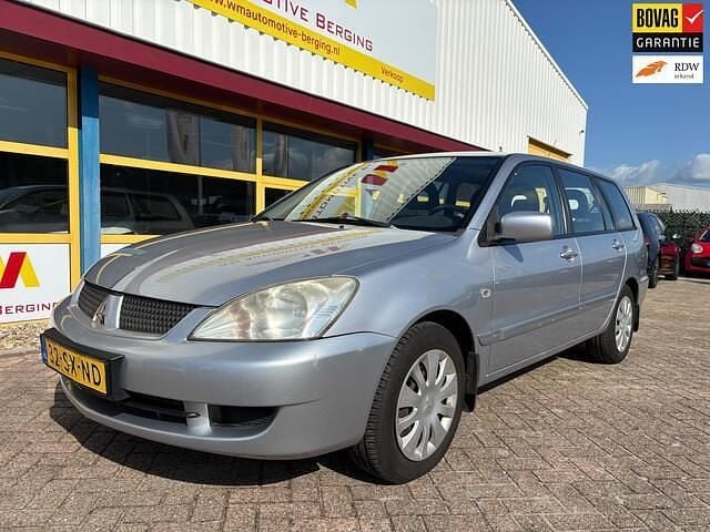 Grijs, metallic lak Gebruikt 2006 Mitsubishi Lancer Inform Stationwagen | € 1.499 (Eerlijke prijs) - Afbeelding 1/4