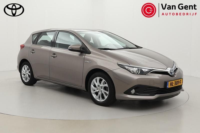 Bruin Gebruikt 2015 Toyota Auris Hybrid Hatchback | € 15.999 (Eerlijke prijs) - Afbeelding 1/4