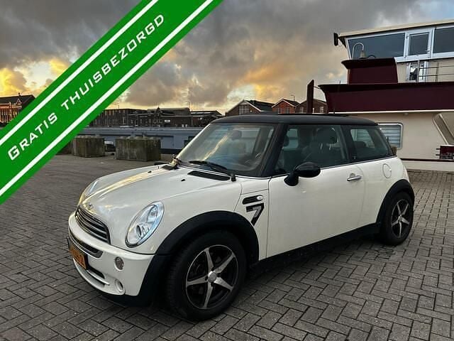 Wit (metallic) Gebruikt 2006 Mini Cooper Hatchback | € 3.750 (Goede deal) - Afbeelding 1/4