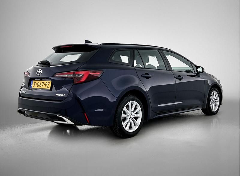 Occasion Toyota Corolla Hybrid Active 2024 Blauw Stationwagen