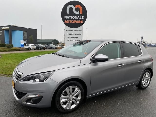 Grijs Gebruikt 2014 Peugeot 308 Premium Hatchback | € 6.250 (Eerlijke prijs) - Afbeelding 1/4