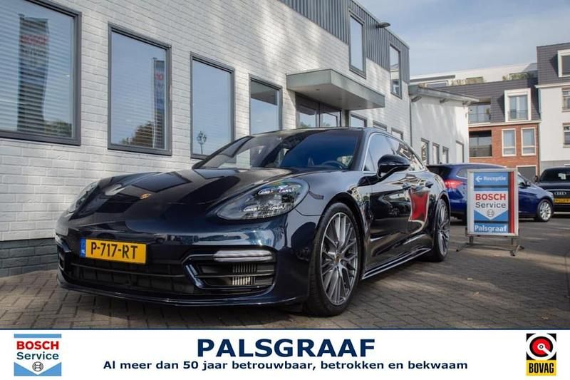 Blauw Occasion 2022 Porsche Panamera Platinum Edition Stationwagen | € 99.500 (Duur) - Afbeelding 1/4