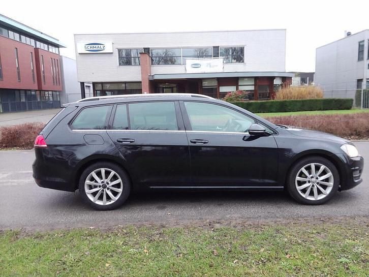 Zwart (metallic) Gebruikt 2014 VW Golf VII Highline Stationwagen | € 5.450 (Eerlijke prijs) - Afbeelding 1/4