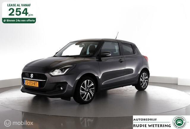 Grijs, metallic lak Gebruikt 2023 Suzuki Swift Style Hatchback | € 18.950 (Eerlijke prijs) - Afbeelding 1/4