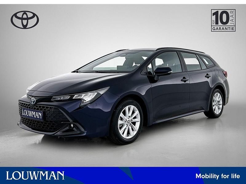Blauw Gebruikt 2025 Toyota Corolla Hybrid Active Stationwagen | € 34.640 (Eerlijke prijs) - Afbeelding 1/3