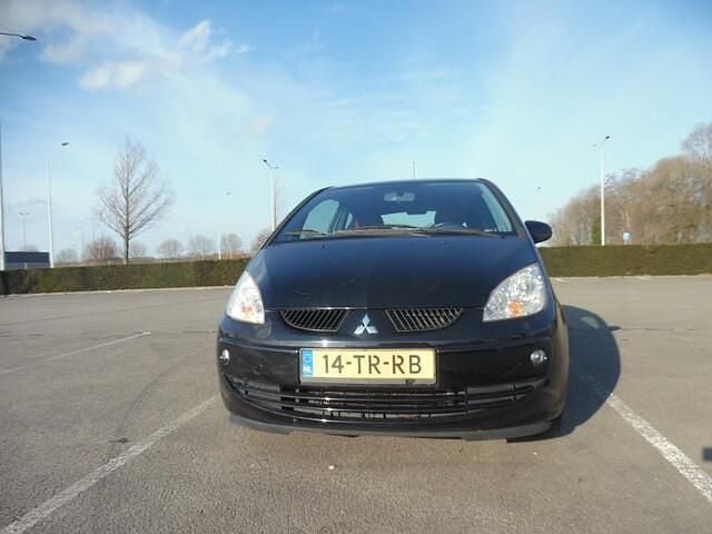 Occasion Mitsubishi Colt 95 PK (69 kW) 2006 Zwart Hatchback
