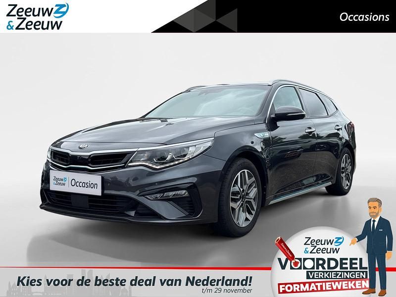 Grijs Gebruikt 2020 Kia Optima Hybrid Sedan | € 21.930 (Eerlijke prijs) - Afbeelding 1/4