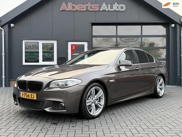 Bruin (metallic) Occasion 2010 BMW 523 Executive Sedan | € 9.980 (Goede deal) - Afbeelding 1/4
