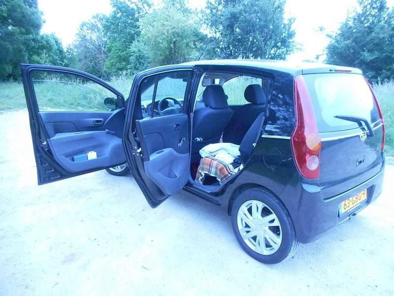 Occasion Daihatsu Cuore 69 PK (50 kW) 2008 Zwart Hatchback