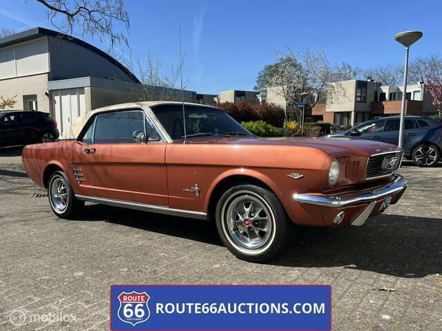 Oranje Gebruikt 1966 Ford Mustang Coupé | € 14.900 - Afbeelding 1/4