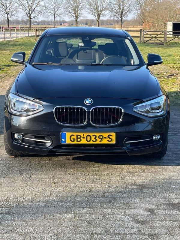 Zwart Gebruikt 2012 BMW 118 Sport Line Hatchback | € 12.500 (Iets duurder) - Afbeelding 1/4