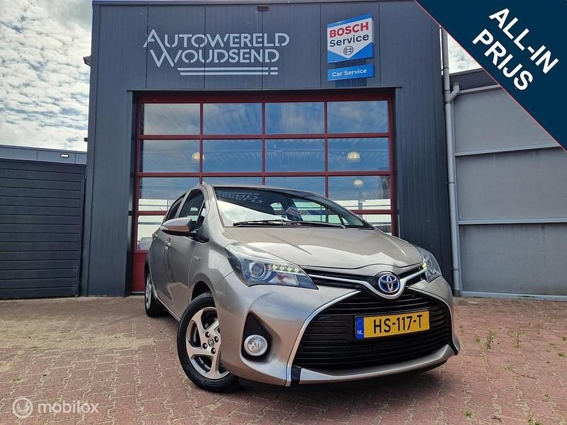 Bruin Occasion 2015 Toyota Yaris Hybrid Hatchback | € 10.995 (Eerlijke prijs) - Afbeelding 1/4