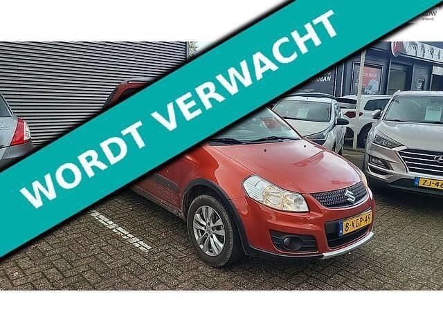 Oranje Gebruikt 2013 Suzuki SX4 MPV | € 5.895 (Eerlijke prijs) - Afbeelding 1/4