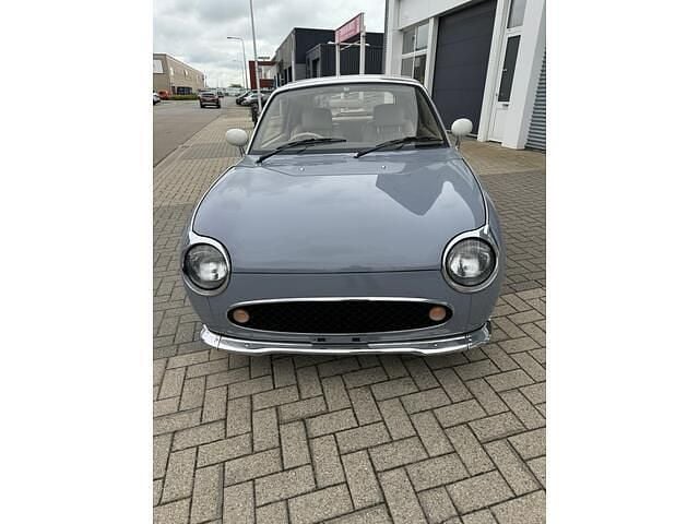 Grijs Occasion 1991 Nissan Figaro Cabriolet | € 12.999 - Afbeelding 1/4