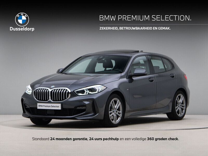 Grijs, metallic lak Gebruikt 2020 BMW 118 Executive Hatchback | € 25.500 (Iets duurder) - Afbeelding 1/4