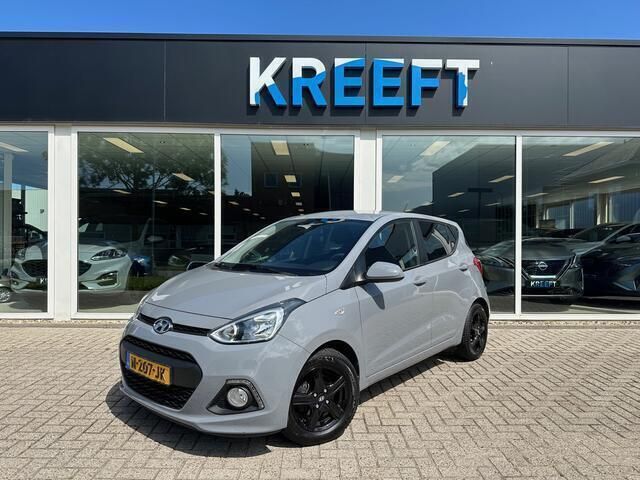 Grijs, metallic lak Gebruikt 2016 Hyundai i10 Comfort Hatchback | € 12.950 (Iets duurder) - Afbeelding 1/4
