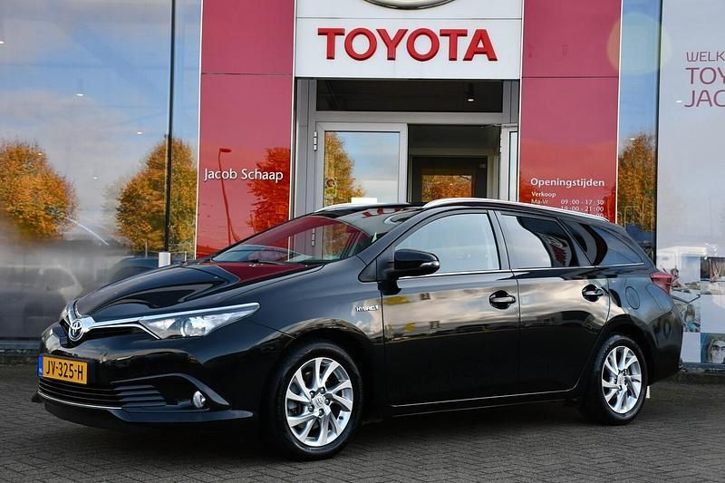 Zwart Gebruikt 2016 Toyota Auris Hybrid Trend Hatchback | € 14.499 (Eerlijke prijs) - Afbeelding 1/4
