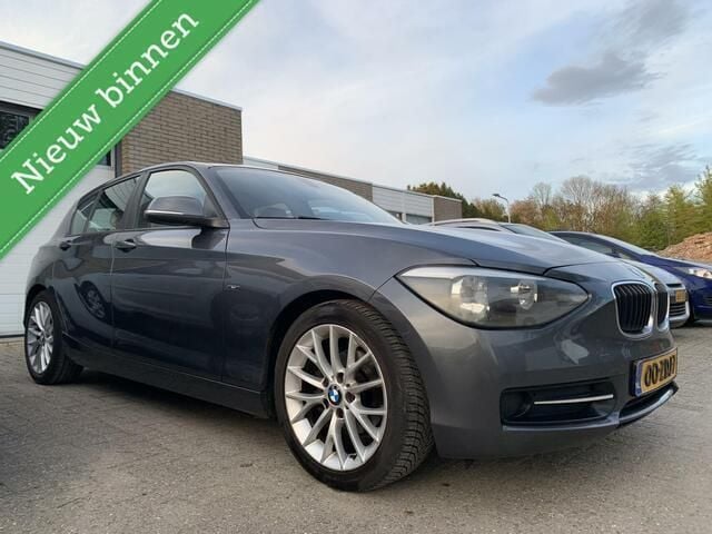 Grijs Gebruikt 2012 BMW 116 Sport Line Hatchback | € 6.950 (Goede deal) - Afbeelding 1/4