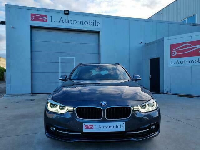 Grijs Gebruikt 2018 BMW 320 Sport Line Stationwagen | € 20.750 (Goede deal) - Afbeelding 1/4