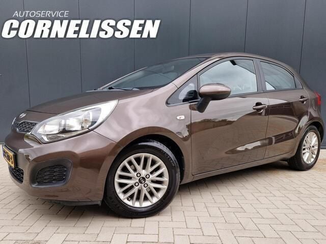 Bruin Gebruikt 2011 Kia Rio Comfort Hatchback | € 5.995 (Eerlijke prijs) - Afbeelding 1/4