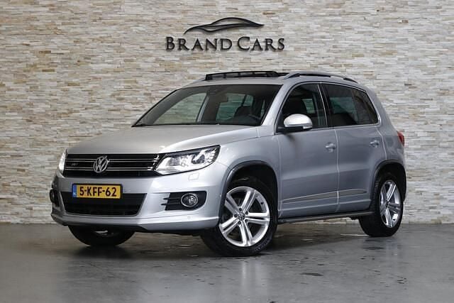 Grijs, metallic lak Gebruikt 2013 VW Tiguan R-line Edition SUV | € 12.999 (Eerlijke prijs) - Afbeelding 1/4