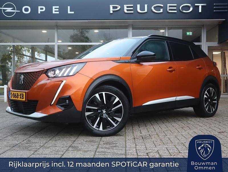 Oranje Gebruikt 2022 Peugeot e-2008 GT SUV | € 19.950 (Eerlijke prijs) - Afbeelding 1/4