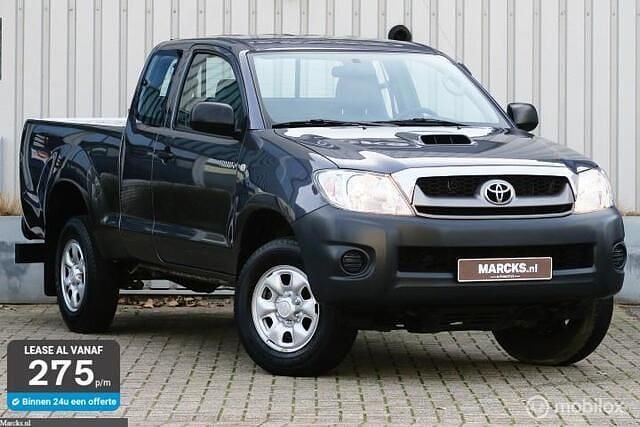 Grijs (metallic) Gebruikt 2010 Toyota HiLux Pickup | € 16.995 - Afbeelding 1/4