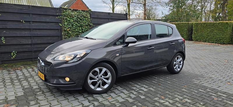 Grijs (metallic) Gebruikt 2016 Opel Corsa Edition Hatchback | € 6.950 (Goede deal) - Afbeelding 1/4